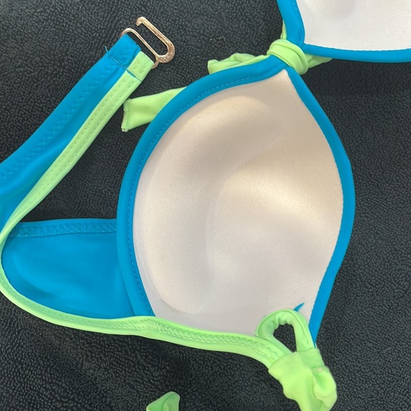Brand new never worn side tie bikini. Bright turquoise with neon green trim. - Picture 5 of 5